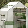 A close-up view of a greenhouse with text overlays highlighting its features. Voir les images du produit
