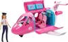 A Barbie doll pilot stands next to a pink Barbie airplane playset. Produktbild-Vorschau
