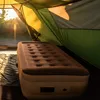 View from inside a tent looking out at sunrise with an air mattress in the foreground. Náhľad obrázku produktu