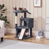 A dark gray cat tree with two cats is shown in a living room setting. Produktbild-Vorschau