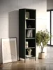 A tall, dark green bookshelf filled with books and decorative items, placed next to a framed piece of art and a potted plant in a well-lit room with wooden flooring. Anteprima dell’immagine prodotto