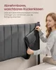 A woman is shown detaching a pillow from a headboard. Produktbild-Vorschau