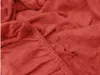 A close-up view of red terry cloth fabric, showing the texture and stitching of a fitted sheet. Náhled obrázku produktu