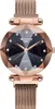 A close-up, studio shot of a women's rose gold watch with a black, starry dial. Produktbild-Vorschau