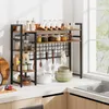 A kitchen counter with a shelf unit filled with various kitchen items. Produktbild-Vorschau