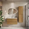 A modern bathroom with a wooden vanity, sink, mirror, and shower. Anteprima dell’immagine prodotto