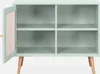 A light green sideboard with a cane door and wooden legs is shown against a white background. Produktbild-Vorschau