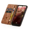 A brown leather flip case for a smartphone, shown open with the phone inside and cards and a banknote in the case. Produktbild-Vorschau