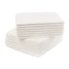 Two stacks of white disposable pads against a white background. Voir les images du produit