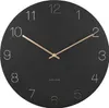 A black wall clock with gold hands and numbers. Produktbild-Vorschau