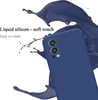 A blue phone case is shown with liquid splashes around it, highlighting its material and ease of cleaning. Náhled obrázku produktu