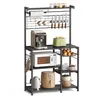 A kitchen baker's rack filled with appliances and kitchenware. Náhled obrázku produktu