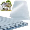 A greenhouse and sheets of polycarbonate panels. Produktbild-Vorschau