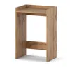 A freestanding bathroom cabinet with a shelf, made of wood-look material. Voir les images du produit