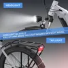 Close-up of an electric bicycle's headlight and taillight with descriptive text overlays. Produktbild-Vorschau
