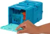 A hand is opening a blue toy cube with orange and aqua colored components inside. Náhled obrázku produktu