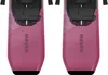 Close-up view of the top of two ski bindings, each attached to a pink ski. Produktbild-Vorschau