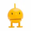 A yellow Hoptimist Soft Bumble toy is shown against a white background. Produktbild-Vorschau