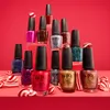 A pyramid-like arrangement of OPI nail polish bottles with candy canes scattered around. Anteprima dell’immagine prodotto