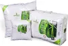 Multiple pillows and a duvet in their transparent packaging, with product information labels. Produktbild-Vorschau