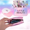 A collage of a children's makeup and nail art set, including a nail dryer, makeup bag, and various cosmetic accessories. Produktbild-Vorschau