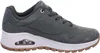 A side view of a gray Skechers sneaker with a white sole and brown outsole. Voir les images du produit