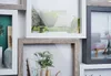 A collage of framed pictures, showcasing different interior scenes. Náhled obrázku produktu