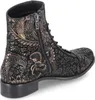 A single black boot with a floral pattern in gold and silver, shown from the side. Produktbild-Vorschau