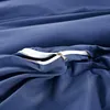 A close-up view of a blue duvet cover with a zipper partially open. Produktbild-Vorschau