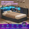 A bed with integrated shelving and LED lighting, showcasing its features. Voir les images du produit