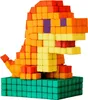 A pixelated dinosaur toy made of foam blocks sits on a green base. Produktbild-Vorschau