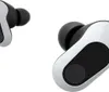 Two white and black wireless earbuds are shown against a white background. Produktbild-Vorschau