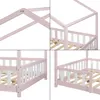 A collage of four close-up images showing different angles of a pink and white house-shaped children's bed frame with a slatted base. Anteprima dell’immagine prodotto