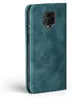 A teal flip phone case is shown from the side against a white background. Produktbild-Vorschau