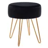 A black velvet stool with gold metal legs on a white background. Podgląd zdjęcia produktu