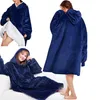 Collage of three images showing a navy blue hoodie blanket worn by models in different poses. Náhled obrázku produktu