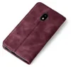 A burgundy flip cover case for a Samsung Galaxy J5 2017 is shown from a diagonal top-down view against a white background. Produktbild-Vorschau