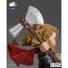 A close-up shot of a stylized figurine of Thor holding his axe. Náhled obrázku produktu