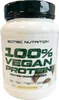 A white plastic container of protein powder with green and white labeling. Produktbild-Vorschau
