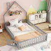 A child's bedroom with a house-shaped bed, shelves, and storage units. Voir les images du produit