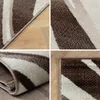 Nowoczesny dywan z dynamicznym falistym wzorem – stylowy i Podgląd zdjęcia produktu 4