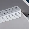 A close-up view of a white metal corner profile with perforations, used in drywall construction for walls or ceilings. Produktbild-Vorschau