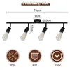 A diagram showing the dimensions and features of a black ceiling spotlight with four adjustable heads. Voir les images du produit