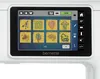 A close-up of a sewing machine's touch screen displaying various embroidery designs. Produktbild-Vorschau