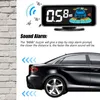 A marketing image showing a car parking sensor display and a car. Podgląd zdjęcia produktu