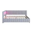 A light gray upholstered bed frame with a headboard featuring integrated LED lighting that emits a pink glow. Náhled obrázku produktu