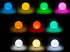A collage of 9 glowing spheres in different colors, each on a black background with a subtle light glow. Produktbild-Vorschau