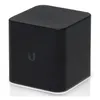A black cube-shaped electronic device with a logo on the front, set against a white background. Produktbild-Vorschau