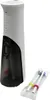 A white and gray oral irrigator with a black water reservoir, next to a package of two replacement brush heads. Náhľad obrázku produktu