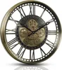 A close-up, studio shot of a decorative wall clock with Roman numerals and visible gears. Produktbild-Vorschau